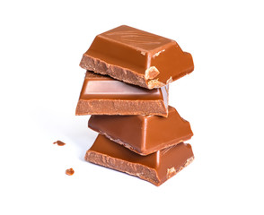 Tasty milk brown chocolate close-up isolated on white background