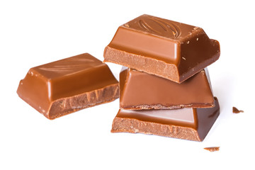 Tasty milk brown chocolate close-up isolated on white background