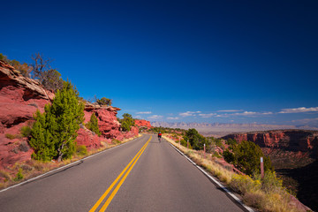 Endles road, Road through the mountains. USA. COLORADO. ARCHES NATIONAL PARK. 