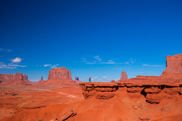 Fototapeta premium Monument Valley. Navajo Tribal Park. Red rocks and mountains. Located on the Arizona–Utah border. USA