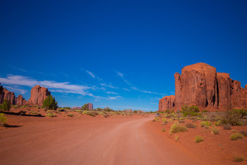 Fototapeta na wymiar Monument Valley. Navajo Tribal Park. Red rocks and mountains. Located on the Arizona–Utah border. USA