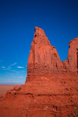 Fototapeta na wymiar Monument Valley. Navajo Tribal Park. Red rocks and mountains. Located on the Arizona–Utah border. USA