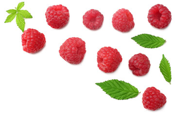ripe raspberries with green leaf isolated on white background. top view