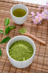 wooden plate spoon drink powder cloth white top