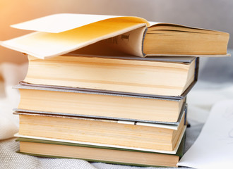Stack of old vintage books on wooden shelf in  university library