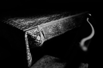 Chair  detail and table in the dark