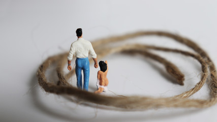 Miniature man and miniature woman. The concept of sex crime.