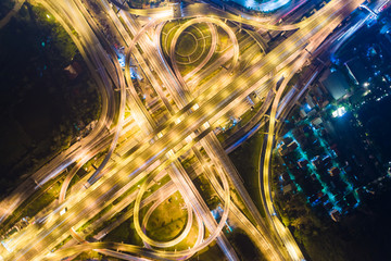 Vehicle light movement rush hour on city traffic junction road