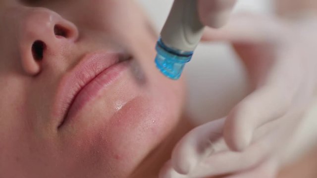 Hydrofacial procedure. Skin Exfoliating, peel, infusion, hydration. 