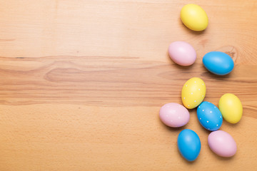 Easter eggs on wooden background