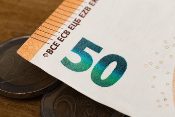 50 euro notes and coins- Image.