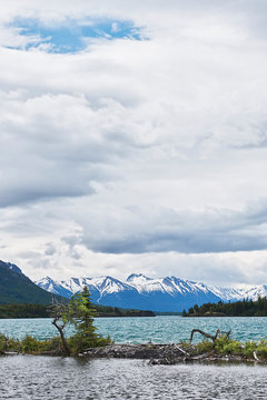 Chilko Lake with snow covered mountains