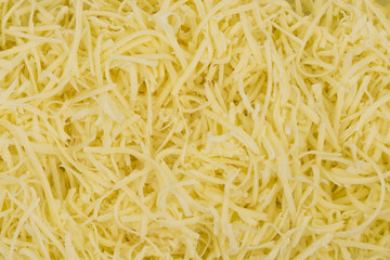Grated cheese texture background