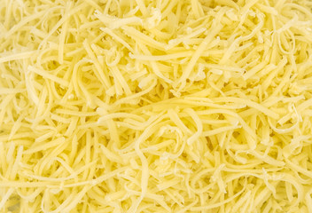 Grated cheese texture background