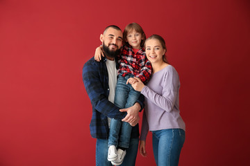 Happy family on color background
