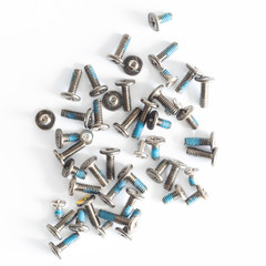 Computer boards screws on a white background