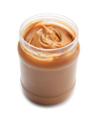 Jar with tasty peanut butter on white background