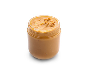 Jar with tasty peanut butter on white background