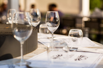 Glasses on white tablecloth