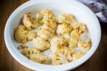 baked cauliflower with spices in ceramic form