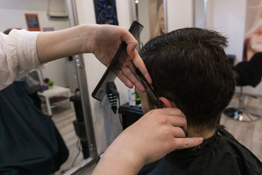 Young Man Getting His Hair Cut