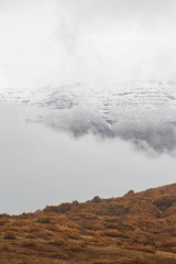 Fog in Snowy Mountains