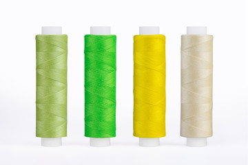 Set of sewing thread coils, miscellaneous colours, isolated on white