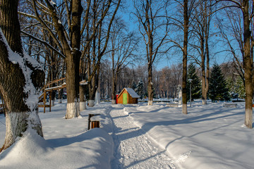 A gazebo covered with fresh snow in the Roman Parc, Neamt, Romania