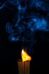 Match, smoke and flame