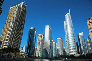 Obraz na płótnie Canvas Almas tower and Jumeirah Lakes Towers, Dubai Multi Commodities Centre, UAE