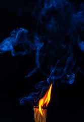 Match, smoke and flame