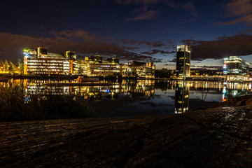 helsinki espoo laguuni at night during sunset, skyline at night with the ocean in the foreground
