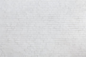 Blurred white brick wall texture for background