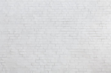 Blurred white brick wall texture for background