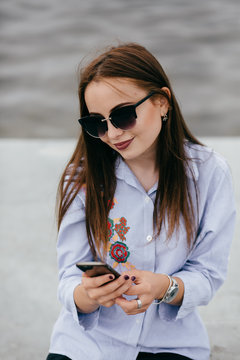 Woman using smart phone mobile