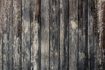 Old wooden background of boards with cracked paint