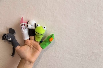 Funny animals puppets in the fingers. Children's activities concept.Happy teachers day 