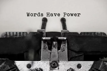 Fotobehang Words have power word with black and white typewriter concept © Sinart Creative