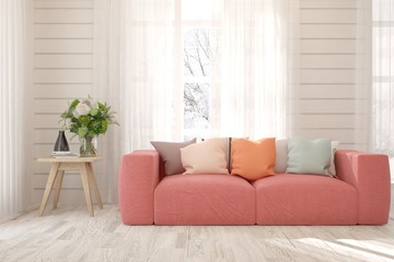White stylish minimalist room with coral sofa. Color of the year 2019. Scandinavian interior design. 3D illustration