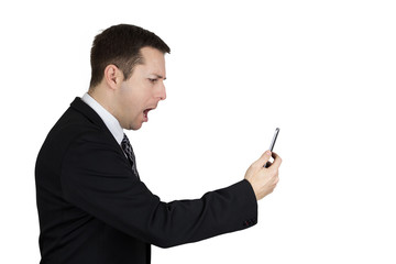 Businessman in Black Suit Holding Smartphone in Hand And Feeling Angry Against White Background