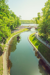 Fototapeta na wymiar Landscape Gomel City Park with a pond in the center among the trees