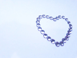 Diamonds shaped as heart on a light background
