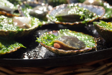 grilled limpets with green mojo, typical avocado in Lanzarote