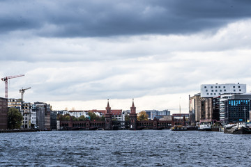 Naklejka premium historical Oberbaum bridge (Oberbaumbruecke) and the river Spree in Berlin, Germany, Europe, vintage filtered style