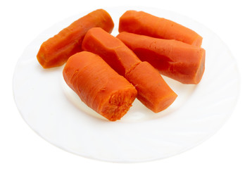 Boiled carrots in a plate on a white background