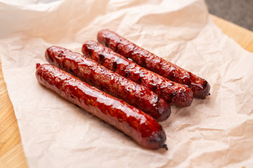 Food and delicious concept - Horse meat sausage covered with ketchup