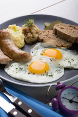German breakfast on a grey plate