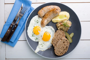 German breakfast on a grey plate