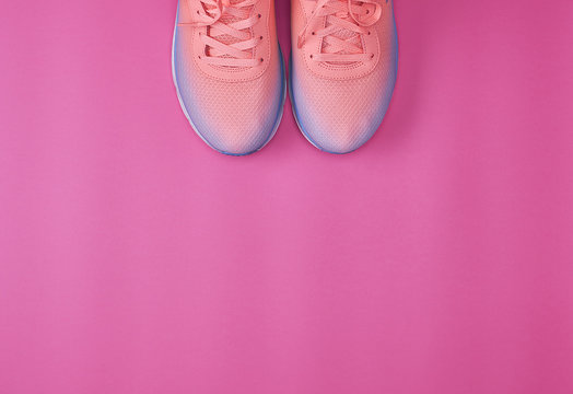 Pair Of  Pink Sneakers With  Laces