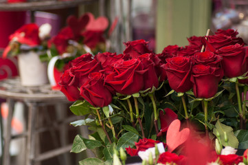 closeup of red roses bouqet at the florist for the valentines day